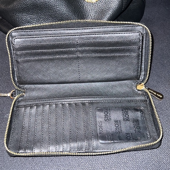 Gently used Michael Kors black purse with matching wallet - Picture 5 of 7